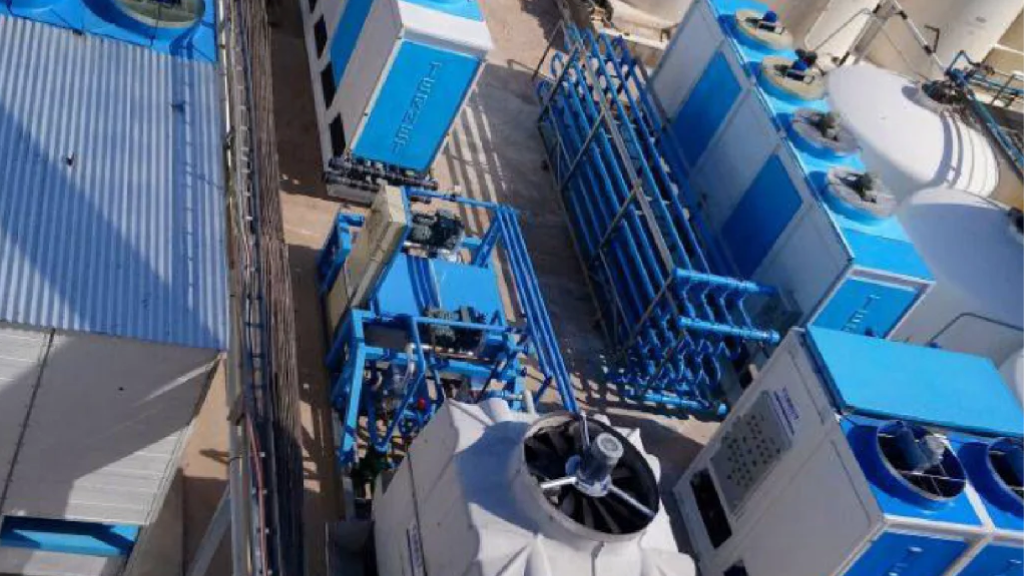 a high angle view of several blue and white machines